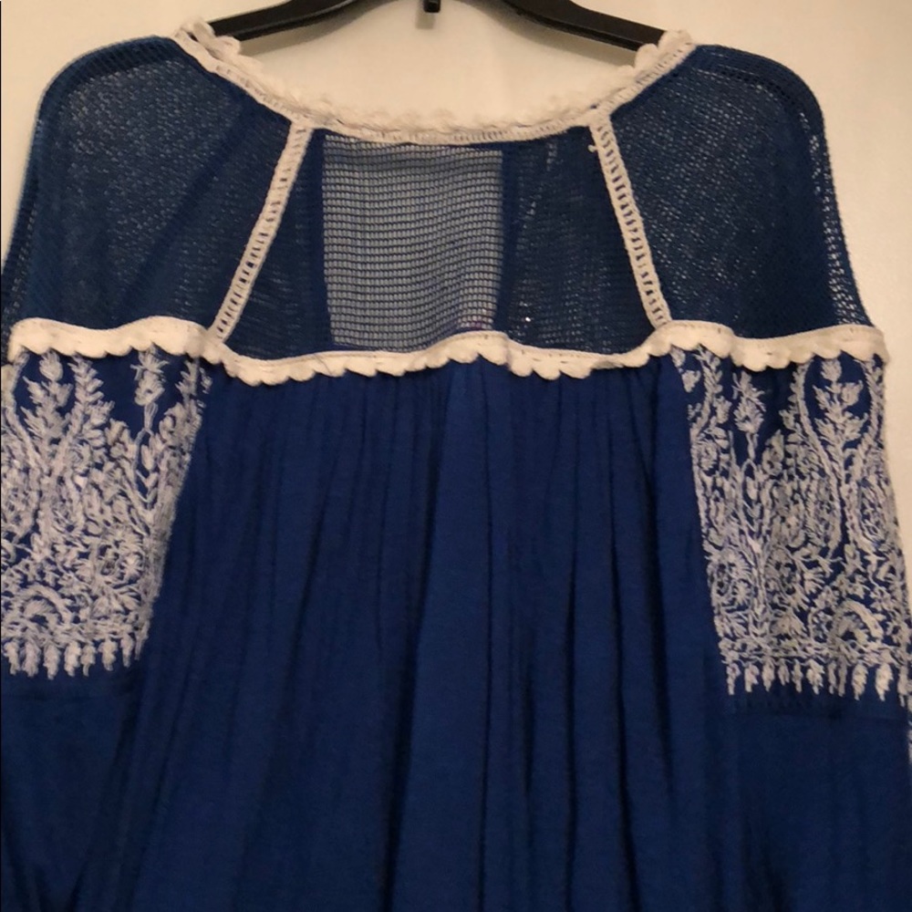 Worn only a few times. Super cute Free People top.